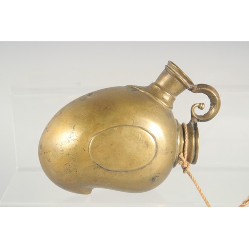 46 - TWO SMALL BRASS HUQQA BASES, together with a brass cup, (3).