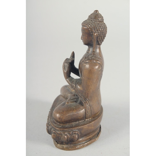54 - A BRONZE FIGURE OF A SEATED BUDDHA, 14cm high.