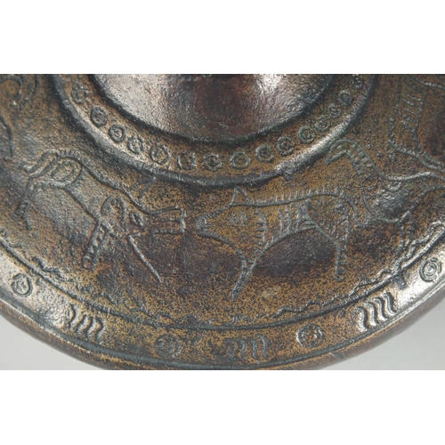 55 - AN EARLY BRONZE CIRCULAR VASE, with chased decoration of a band of various animals, 21cm high.
