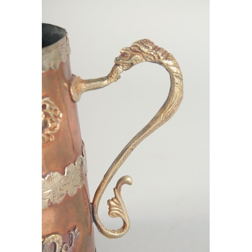 57 - A CHINESE COPPER AND BRASS JUG, with applied dragons, 19cm high.