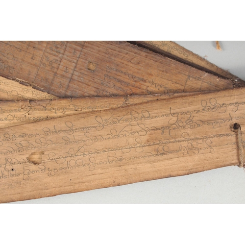 59 - A HEBREW SCRIPT BOOK with wooden ends.