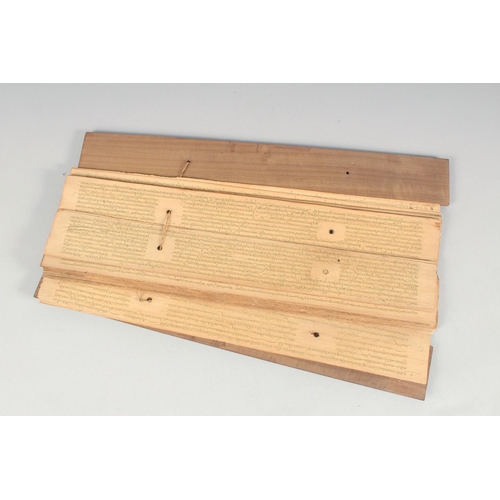 59 - A HEBREW SCRIPT BOOK with wooden ends.