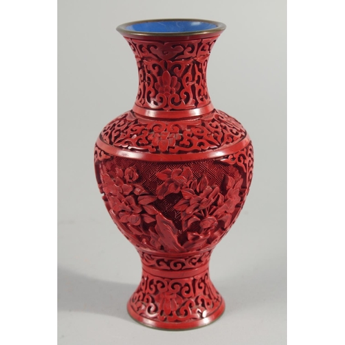 9 - A PAIR OF CHINESE CINNABAR LACQUER VASES, decorated with landscape scenes, together with two similar... 