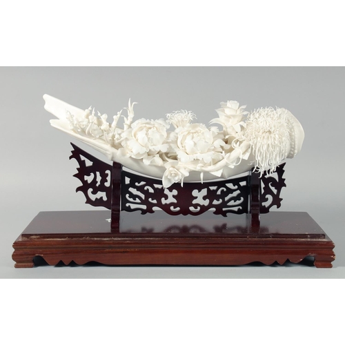 250 - A SUPERB CHINESE PORCELAIN FLORAL SCULPTURE elevated on a hardwood stand, contained within a glass d... 