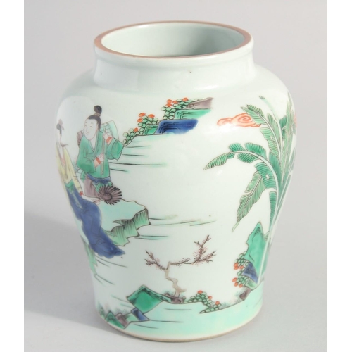 131 - A CHINESE FAMILLE VERTE PORCELAIN VASE, painted with figures by water, 16cm high.