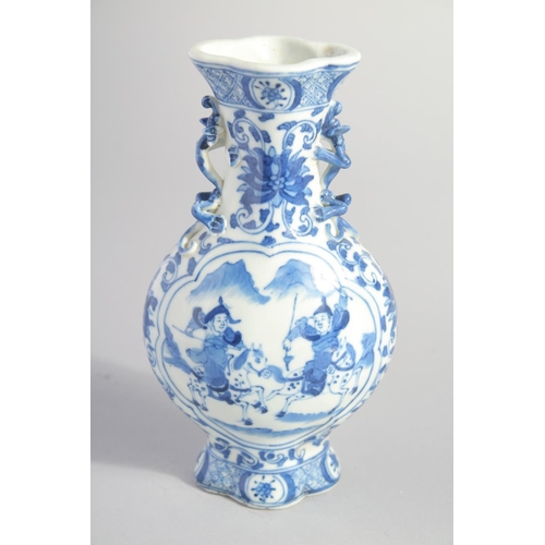 136 - A CHINESE BLUE AND WHITE PORCELAIN VASE, with moulded handles and painted with figures, mark to base... 