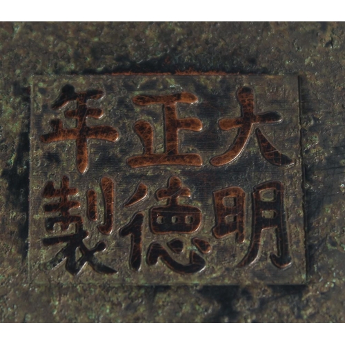 145 - A GOOD CHINESE BRONZE TRIPOD CENSER, with six-character mark to base, 11.5cm diameter.