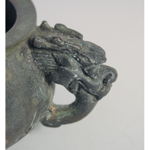 146 - A CHINESE BRONZE TWIN HANDLE CENSER, the handles formed as dragon heads, character mark to base, 18c... 