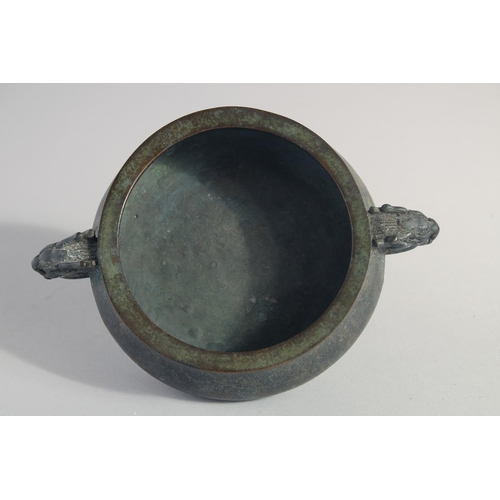 146 - A CHINESE BRONZE TWIN HANDLE CENSER, the handles formed as dragon heads, character mark to base, 18c... 