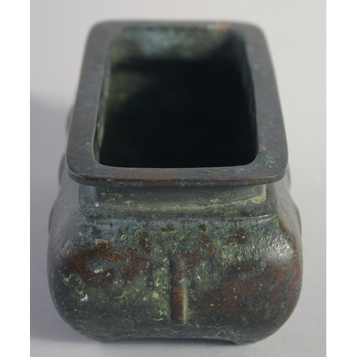 147 - A CHINESE BRONZE RECTANGULAR CENSER, the base with character mark, 15cm long.