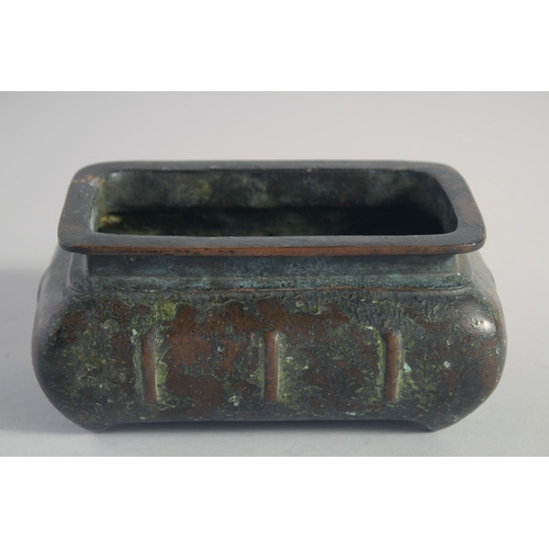 147 - A CHINESE BRONZE RECTANGULAR CENSER, the base with character mark, 15cm long.