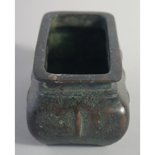 147 - A CHINESE BRONZE RECTANGULAR CENSER, the base with character mark, 15cm long.