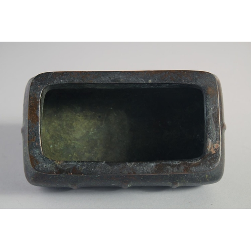 147 - A CHINESE BRONZE RECTANGULAR CENSER, the base with character mark, 15cm long.