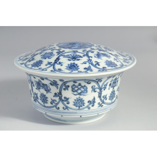 152 - A CHINESE MING STYLE BLUE AND WHITE PORCELAIN BOWL AND COVER, the interior with six-character mark, ... 