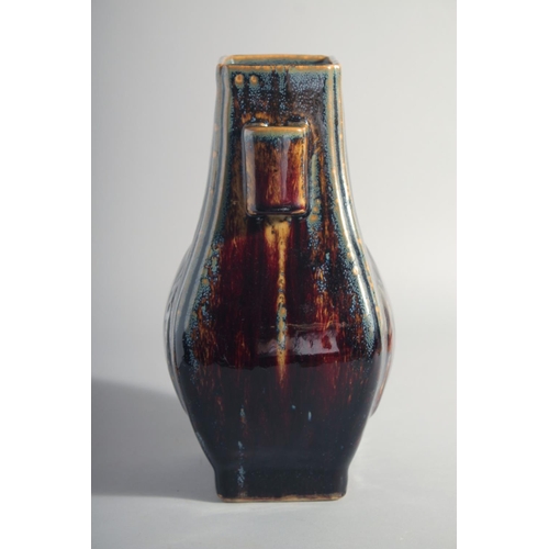 161 - A CHINESE HU SHAPE FLAMBE GLAZE VASE, the base with Yongzheng mark, 30.5cm high.