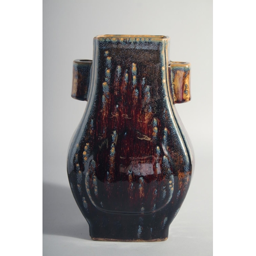 161 - A CHINESE HU SHAPE FLAMBE GLAZE VASE, the base with Yongzheng mark, 30.5cm high.