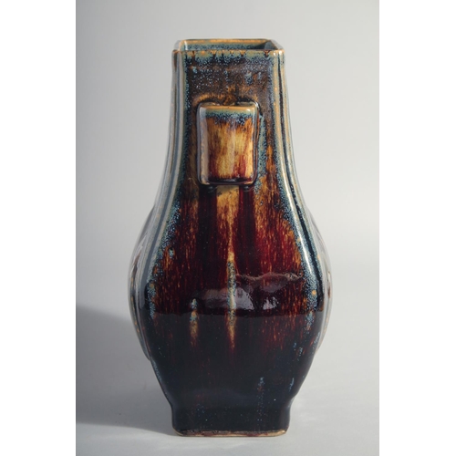 161 - A CHINESE HU SHAPE FLAMBE GLAZE VASE, the base with Yongzheng mark, 30.5cm high.