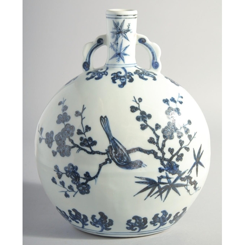 165 - A CHINESE MING STYLE BLUE AND WHITE PORCELAIN MOON FLASK, each side paint with a bird on a branch, b... 