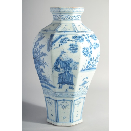 167 - A LARGE CHINESE BLUE AND WHITE GLAZED POTTERY VASE, painted with figures and flora, 42cm high.