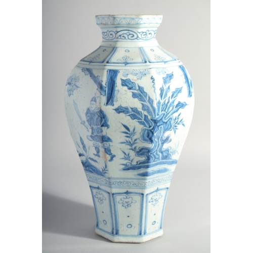 167 - A LARGE CHINESE BLUE AND WHITE GLAZED POTTERY VASE, painted with figures and flora, 42cm high.