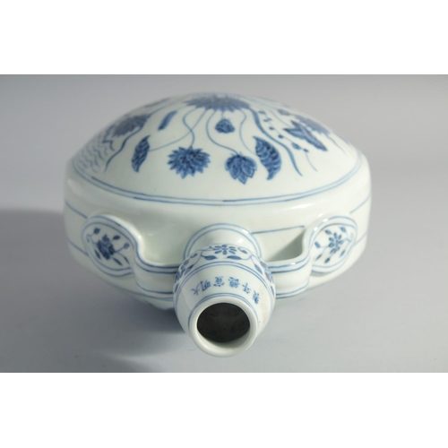 174 - A CHINESE BLUE AND WHITE PORCELAIN TWIN HANDLE MOON FLASK, decorated with a central spray of flora, ... 