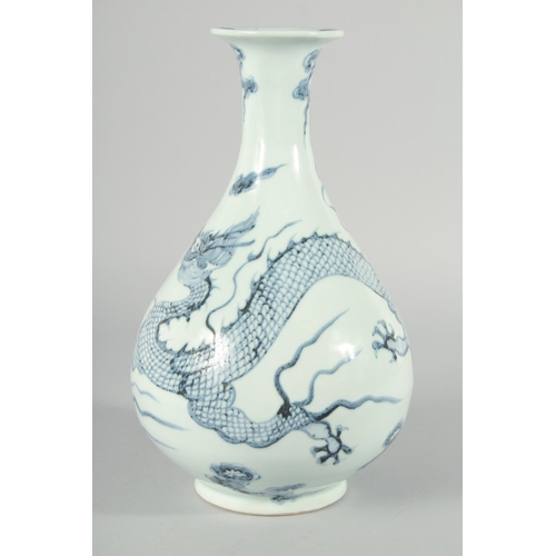 183 - A CHINESE BLUE AND WHITE PORCELAIN YUHUCHUNPIN VASE, painted with a large dragon, 31.5cm high.