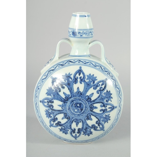 186 - A CHINESE BLUE AND WHITE TWIN HANDLE 'YIN-YANG' MOON FLASK, with six-character mark, 27.5cm high.