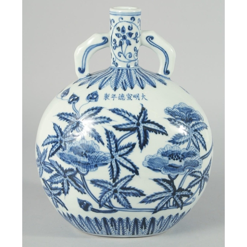 190 - A CHINESE BLUE AND WHITE PORCELAIN TWIN HANDLE MOON FLASK, decorated with native flora, bearing six-... 