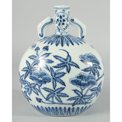 190 - A CHINESE BLUE AND WHITE PORCELAIN TWIN HANDLE MOON FLASK, decorated with native flora, bearing six-... 