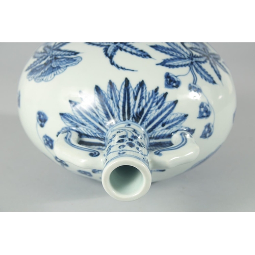 190 - A CHINESE BLUE AND WHITE PORCELAIN TWIN HANDLE MOON FLASK, decorated with native flora, bearing six-... 