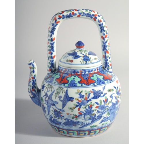 195 - A CHINESE MING STYLE DOUCAI PORCELAIN TEAPOT, painted with cranes and flora, base with six-character... 