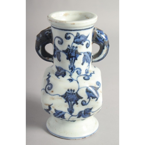 201 - A CHINESE BLUE AND WHITE PORCELAIN TWIN HANDLE VASE, six-character mark to base, 18cm high.