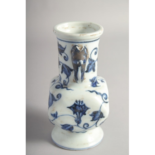 201 - A CHINESE BLUE AND WHITE PORCELAIN TWIN HANDLE VASE, six-character mark to base, 18cm high.