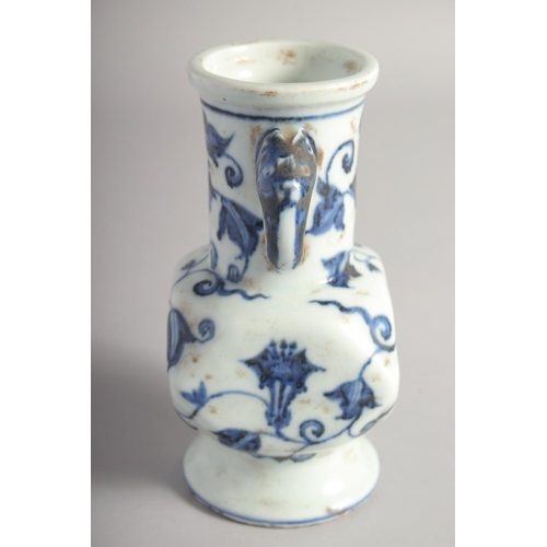 201 - A CHINESE BLUE AND WHITE PORCELAIN TWIN HANDLE VASE, six-character mark to base, 18cm high.