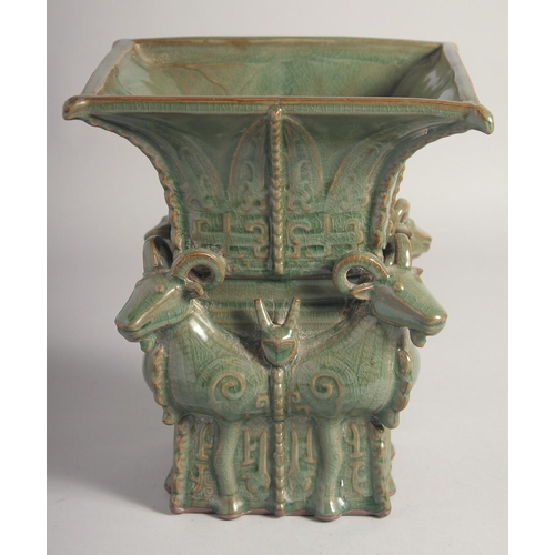 204 - AN UNUSUAL CHINESE FOUR-RAMS SQUARE FORM ZUN VASE, 23cm high.