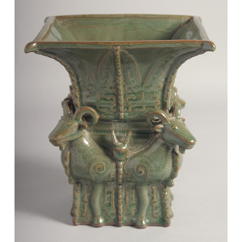 204 - AN UNUSUAL CHINESE FOUR-RAMS SQUARE FORM ZUN VASE, 23cm high.