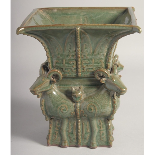 204 - AN UNUSUAL CHINESE FOUR-RAMS SQUARE FORM ZUN VASE, 23cm high.