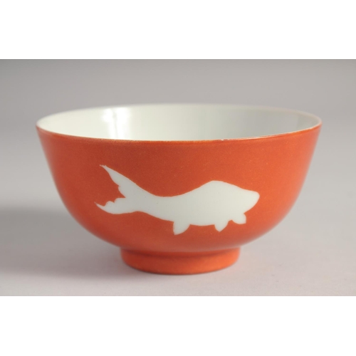 205 - A CHINESE CORAL RED GLAZE PORCELAIN BOWL, bearing Qianlong six-character mark, 12.5cm diameter.