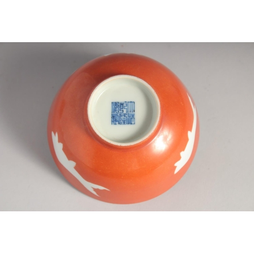 205 - A CHINESE CORAL RED GLAZE PORCELAIN BOWL, bearing Qianlong six-character mark, 12.5cm diameter.