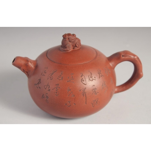 210 - A CHINESE YIXING TEAPOT; signed by Gu Jing Zhou, 16cm spout to handle.