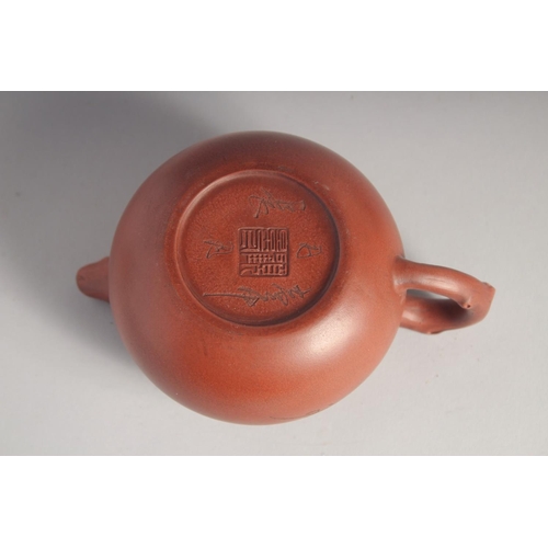 210 - A CHINESE YIXING TEAPOT; signed by Gu Jing Zhou, 16cm spout to handle.