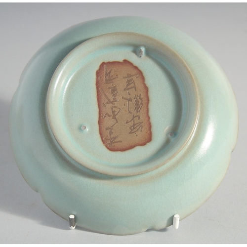 216 - A CHINESE CELADON PETAL FORM DISH, together with collection box, dish inscribed to the base, 14cm di... 