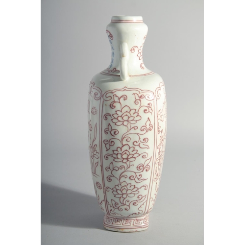 223 - A CHINESE UNDERGLAZE RED TWIN HANDLE FLASK VASE, decorated with fish and aquatic flora, inscribed to... 