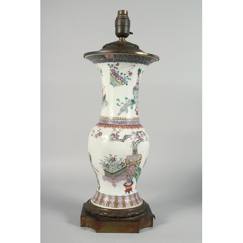 231 - A LARGE CHINESE FAMILLE ROSE PORCELAIN VASE LAMP, the body painted with potted flowers, vases and ja... 