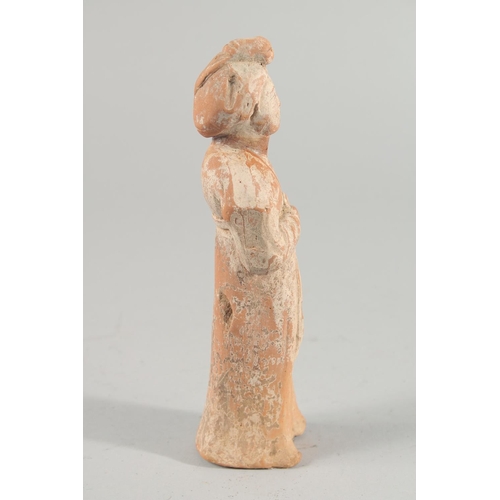 238 - A CHINESE TERRACOTTA FIGURE, 20.5cm high.