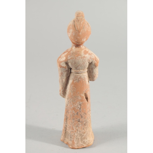 238 - A CHINESE TERRACOTTA FIGURE, 20.5cm high.