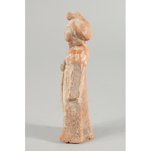 238 - A CHINESE TERRACOTTA FIGURE, 20.5cm high.