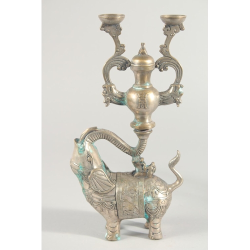 241 - A PAIR OF METAL ELEPHANT FORM CANDLESTICKS, 31cm high.