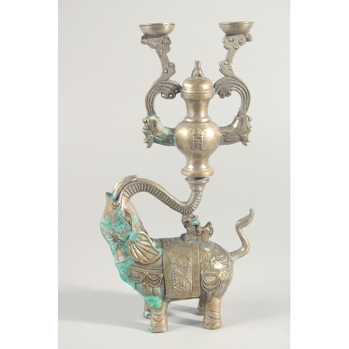 241 - A PAIR OF METAL ELEPHANT FORM CANDLESTICKS, 31cm high.