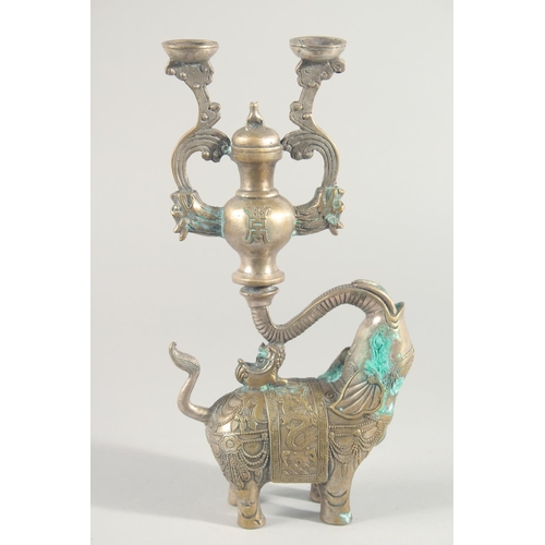 241 - A PAIR OF METAL ELEPHANT FORM CANDLESTICKS, 31cm high.